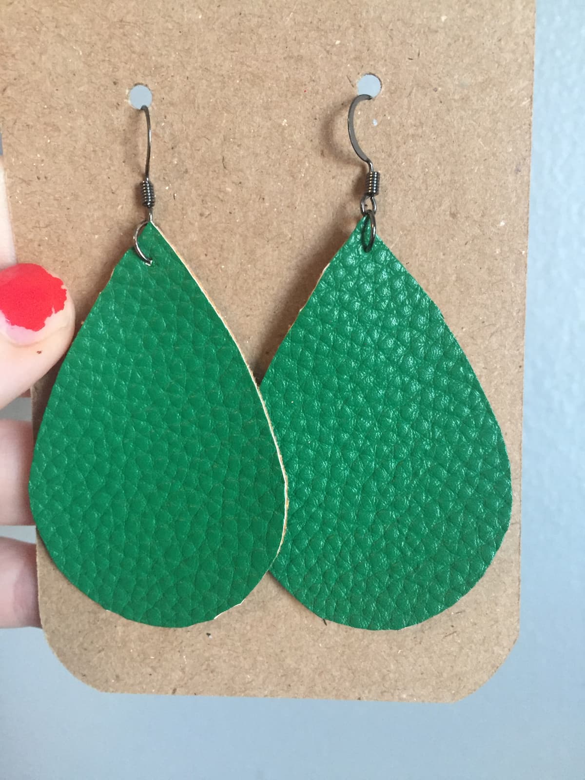 The selected image of Green Pebbled Leather Dangle Earrings