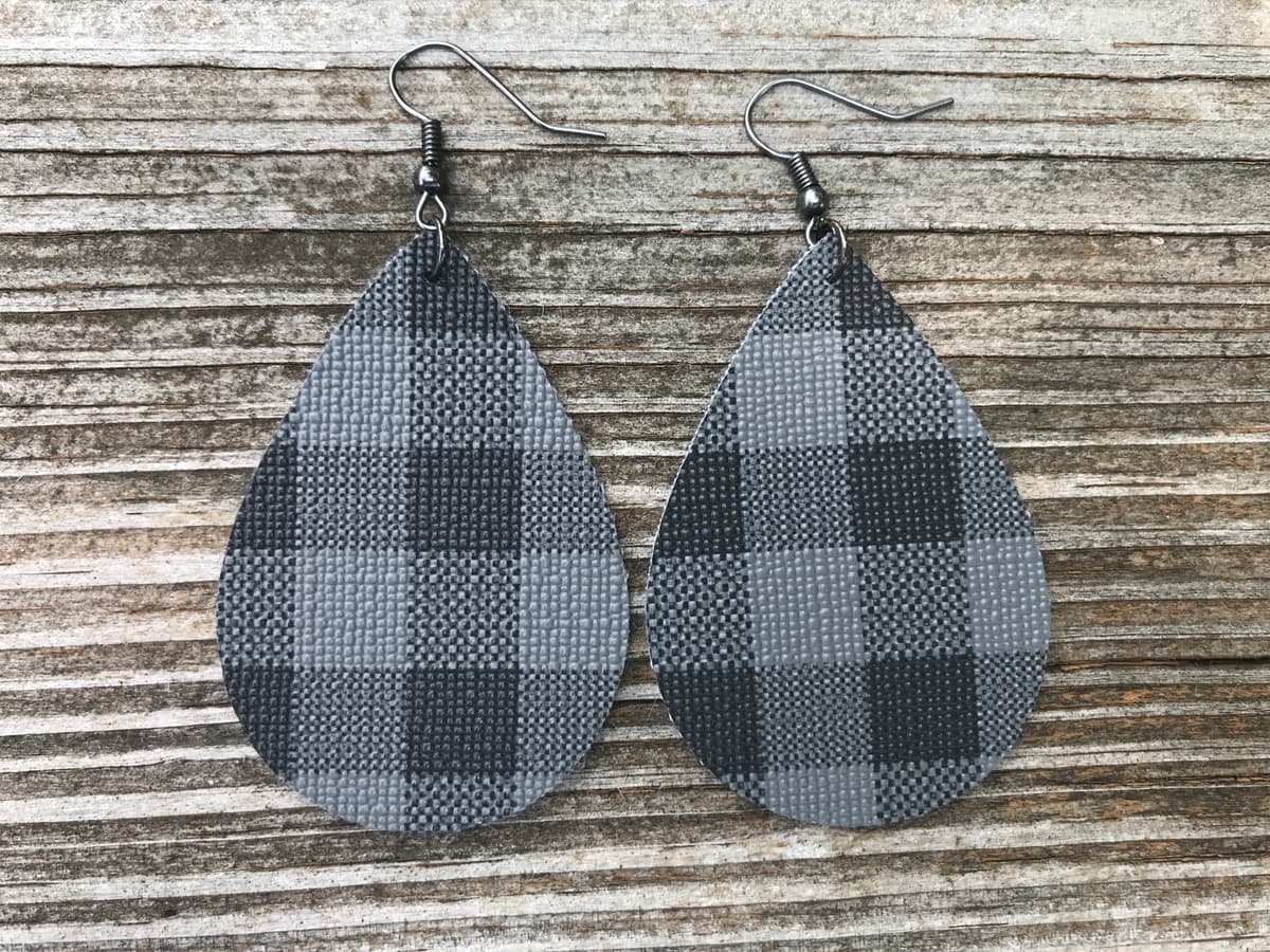 The selected image of Gray and Black Plaid Faux Leather Earrings