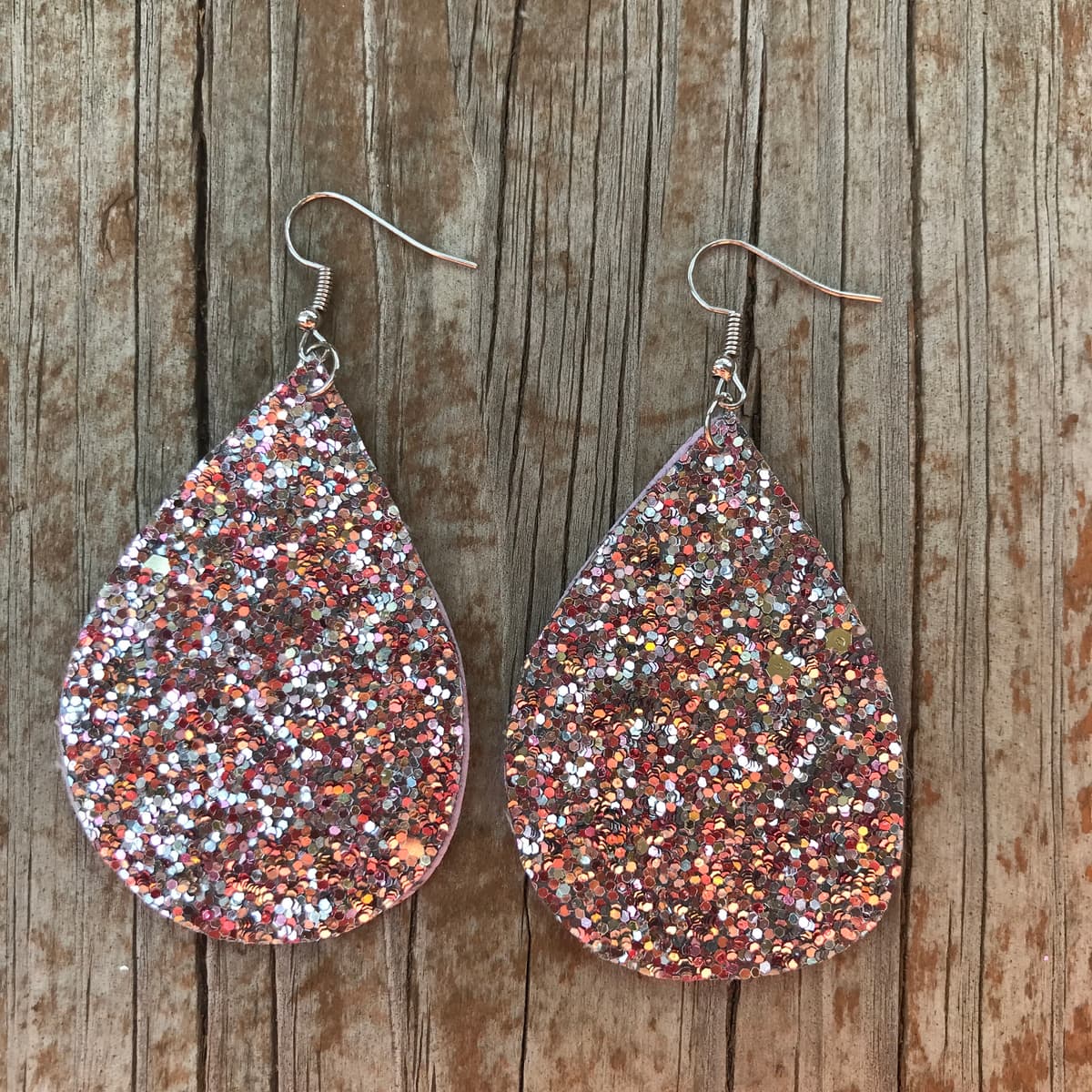 The selected image of Pink and Silver Sparkly Dangle Earrings