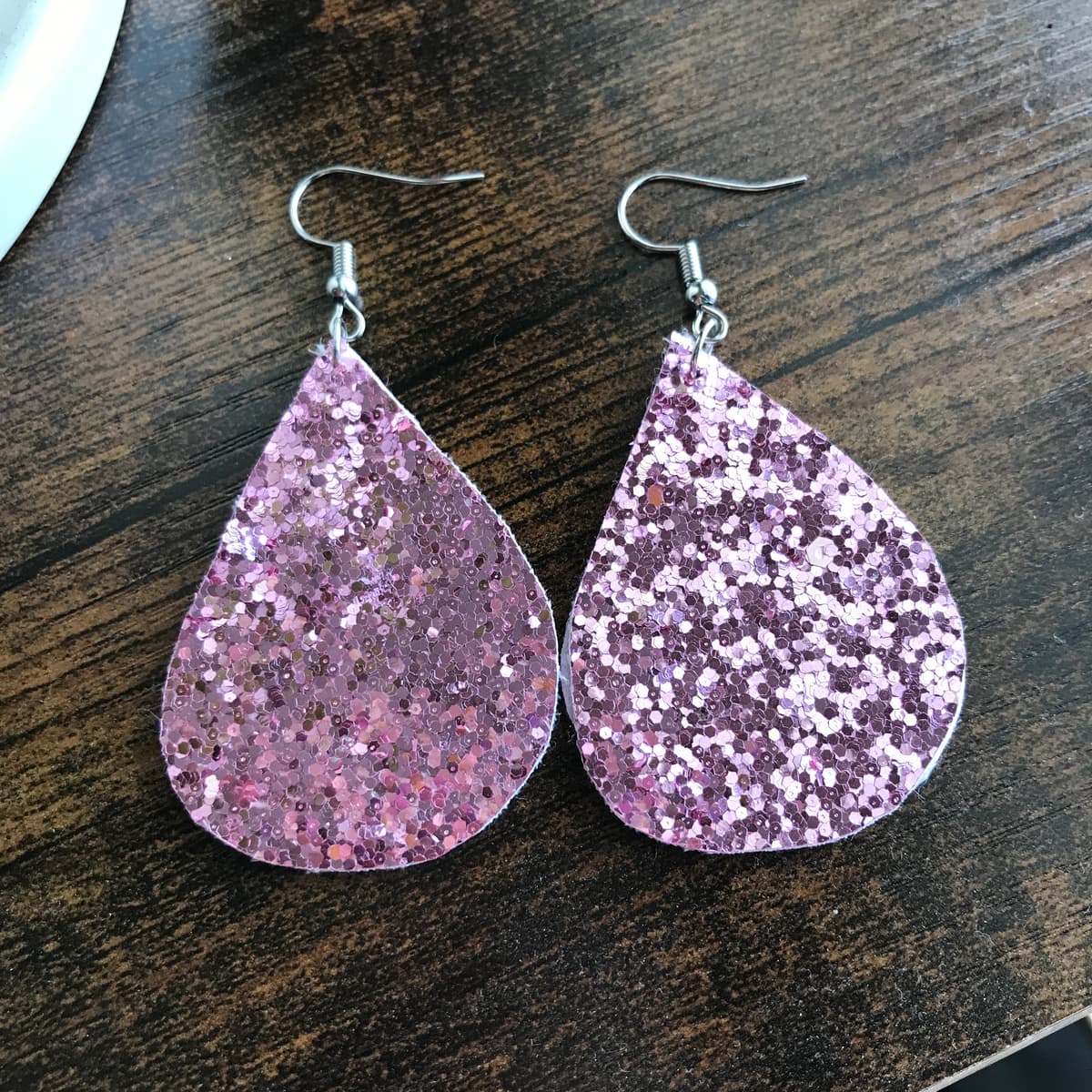 The selected image of Mini Pink Sparkly Dangle Earrings