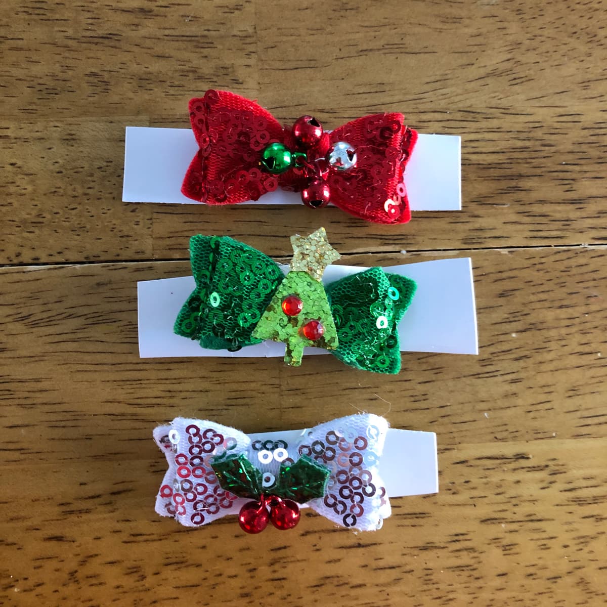 The selected image of Small Sparkly Christmas Hair Bows (Sold Separately)