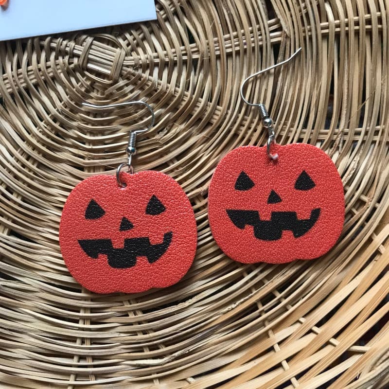 The selected image of Faux Leather Jack-o-Lantern Pumpkin Earrings