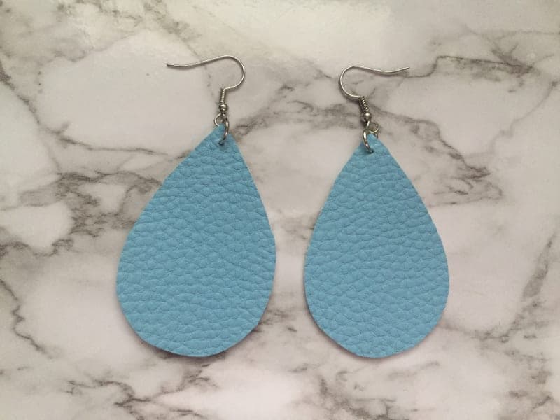 The selected image of Light Blue Pebbled Leather Dangle Earrings