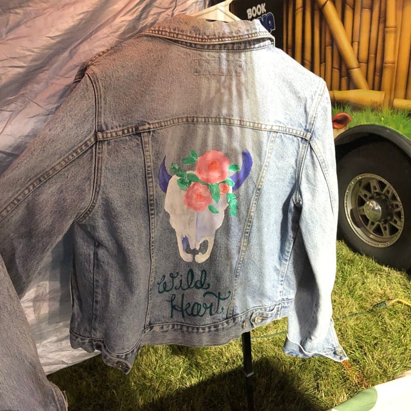 The selected image of Upcycled Hand-painted Western Cow Skull Denim Jacket