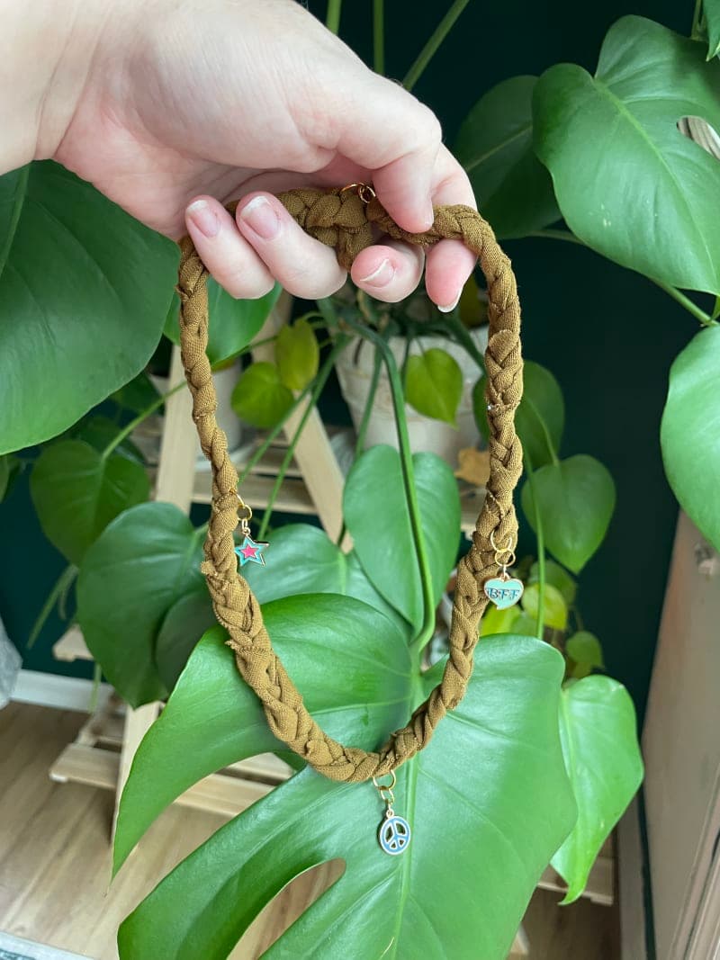 The selected image of Brown Caramel Hippie Bandana Charm Necklace