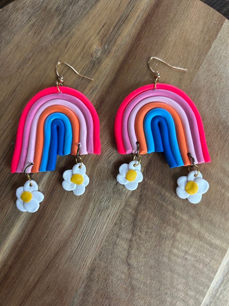 The selected image of Colorful Vivd Large Rainbow Earrings with Daisy Dangles