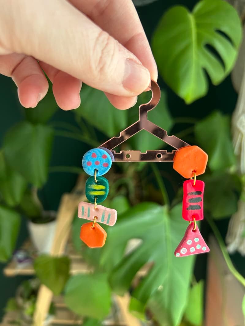 The selected image of Asymmetrical Geometric Shapes and Fun Patterns Dangle Earrings