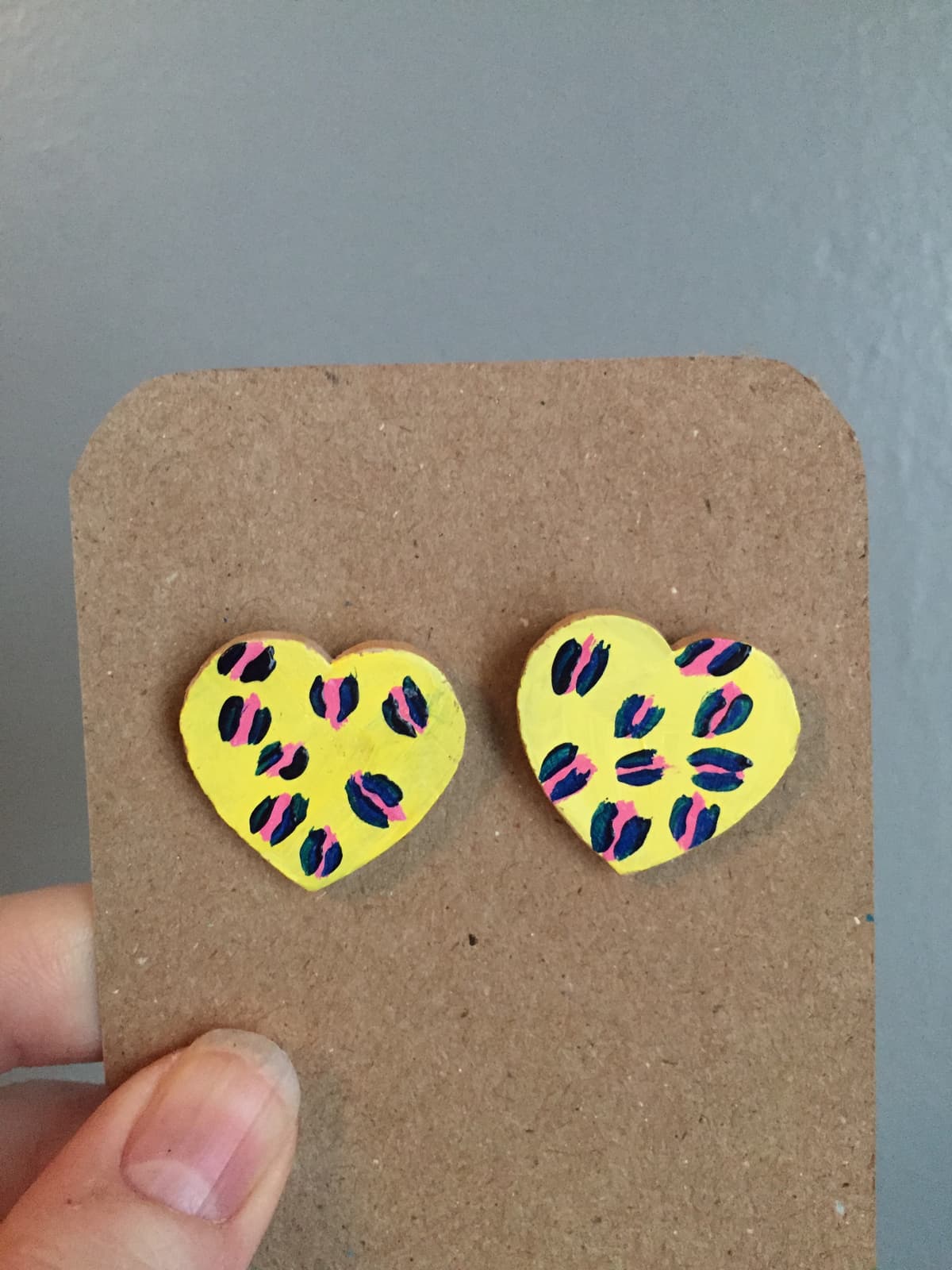 The selected image of Yellow and Pink Leopard Print Handpainted Wooden Heart Stud Earrings