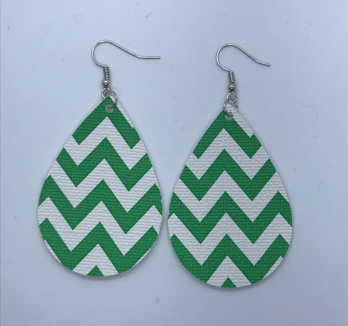 The selected image of White and Green Chevron Faux Leather Earrings