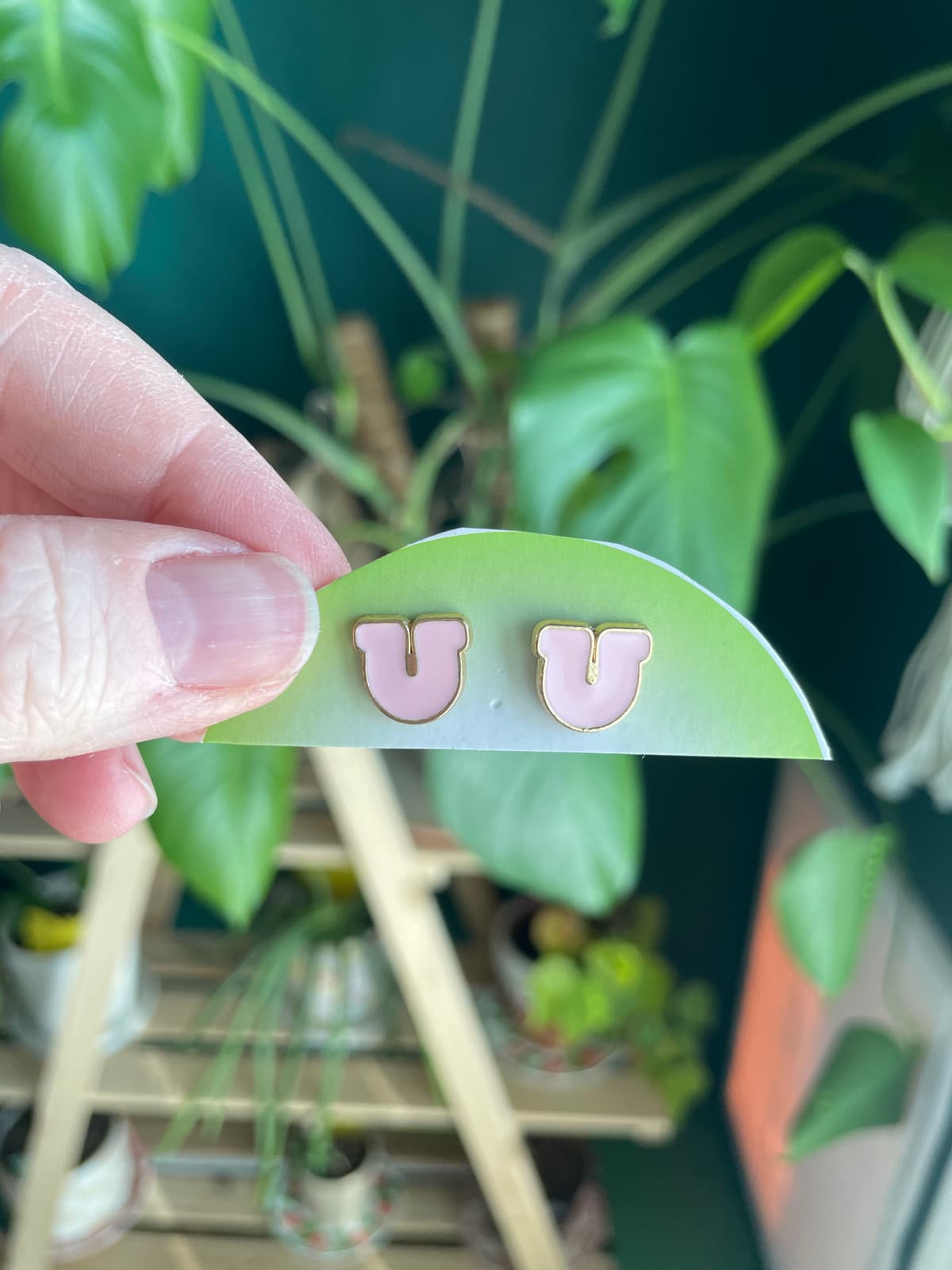 The selected image of Pink and Gold Lucky Horse Shoe Dangle Earrings